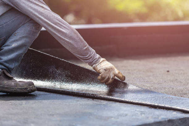 Professional Basement Waterproofing technician working in Munford, TN